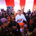 Gubernur Sumsel, Herman Deru  bersama ratusan anak terlihat tengah merayakan puncak peringatan HAN. (Foto:J)