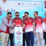Wagub Sumsel, Cik Ujang didampingi Kepala Bank Indonesia Sumatera Selatan, Bambang Pramono, saat meresmikan  peluncuran QRIS Run Bidar Fest.(Foto:J)